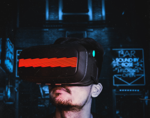 Man in Virtual Reality Headset, entering the meta, symbolises the future of the Metaverse and its impact on business